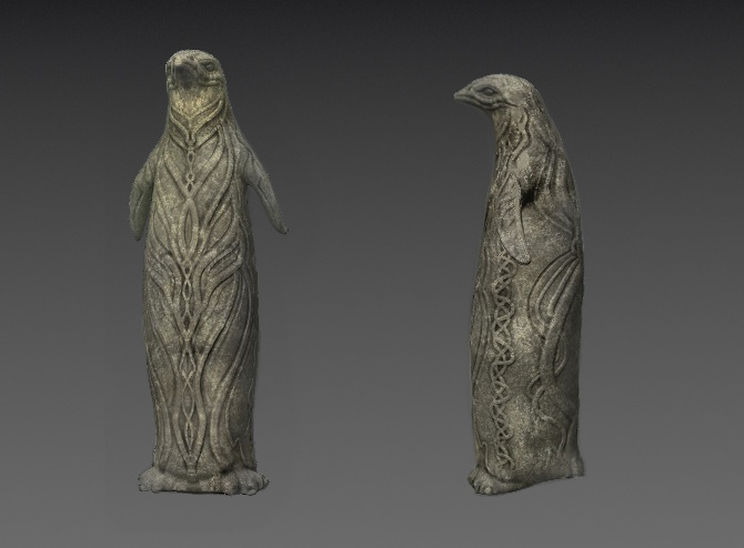 Hiker with a map looking out over a mountain range